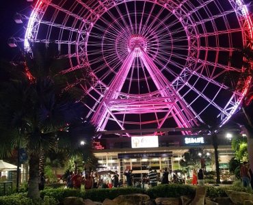 View of The Orlando Eye Ferris wheel during sunset